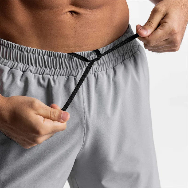 Summer New Gym Jogging Exercise Shorts Men's Sports Fitness Quick-drying Multiple pockets Running Shorts Men Casual Shorts